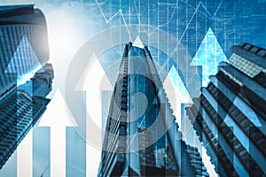 The abstract image of the skyscraper image overlay with business chart image.