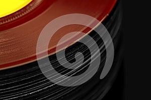 Abstract image of a stack of old vinyl records