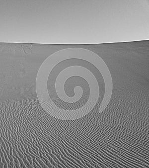 Abstract image of the surface of a dune in the Sahara in Sudan, black and white photo