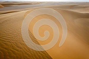 Abstract image of the surface of a sloping dune in the Sahara in Sudan photo