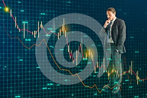 Abstract image of thoughtful businessman with falling business chart on blurry grid background. Crisis and financial downfall