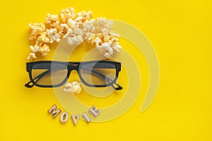 Abstract image of viewer, 3D glasses and popcorn, text