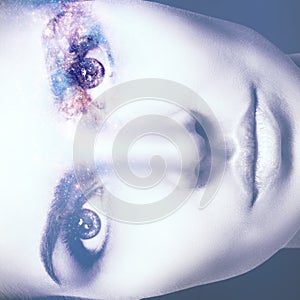 Abstract image of woman face and cosmic galaxy.