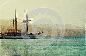 Abstract image of the yacht at sea. Old style photo