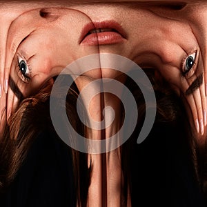 Abstract image of a young woman`s face.