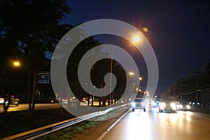 Abstract images, blurry lights, nighttime traffic on the main road