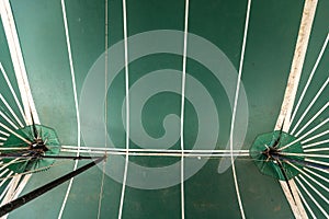 abstract images of a circus tent in green color with white stripes