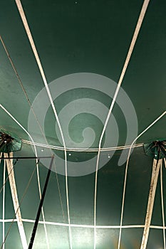 abstract images of a circus tent in green color with white stripes