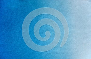 Abstract indigo dark blue navy gradient dyed on cotton cloth texture background