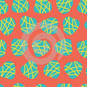 Abstract irregular shapes vector seamless pattern. Turquoise and lime dots on a red background. Great for fabric prints, paper