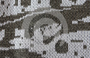 Abstract knitted texture as background of grey and white threads