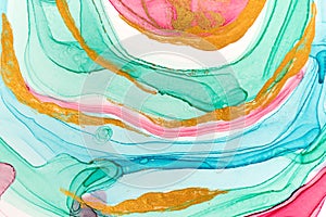 Abstract layers of pink paint on white background. Pink, green, blue and gold round watercolor pattern.