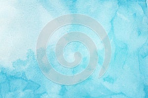 Abstract light blue watercolor background, painted on watercolor paper photo