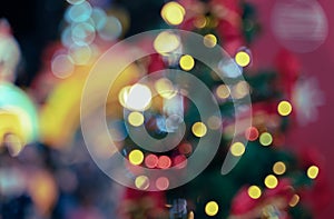 Abstract light celebration background with de- focused lights