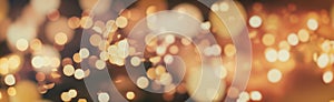 Abstract light celebration background with defocused golden lights for Christmas, New Year, Holiday, party