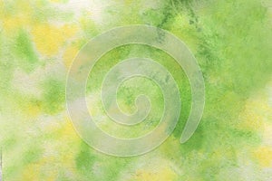 Abstract light color watercolor background. Hand drawn yellow, green, white gradient painting.