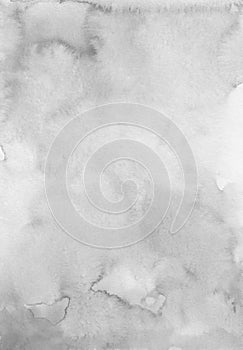 Abstract light gray watercolor background texture, hand painted. Artistic grey backdrop, stains on paper