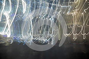 Abstract from light lines on a dark background photo