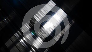 Abstract light patterns create a dynamic interaction of diagonal light and shadow.