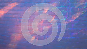 Abstract light patterns on textured brick wall for creative design and decor