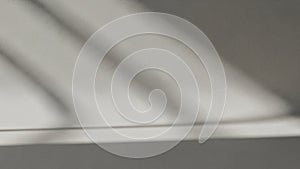 Abstract light and shadow pattern on a textured surface