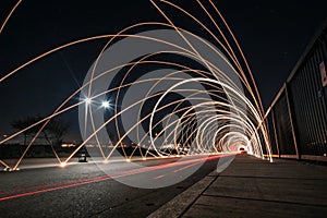Abstract light trails on black background