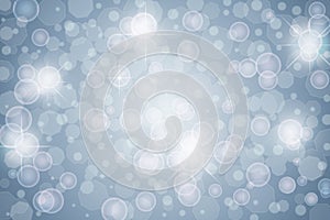 Abstract Lights, Sparkles, Bokeh and Bubbles in Blue Grey Background