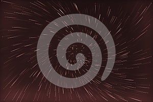 Abstract long exposure of vortex star trails background