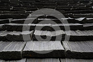 Abstract look of wood shingle roof tiles