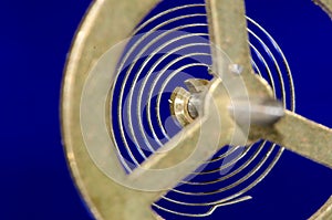 Abstract: Looking Through a Vintage Metallic Balance Wheel to Its Hairspring