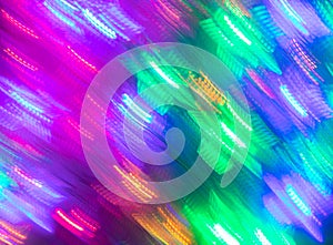 Abstract luminous seamless background of blurred neon lights.