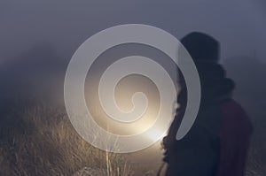 Abstract man portrait lantern in the fog