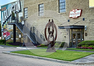 'Momentum', an abstract metal sculpture in front of the historic Vandergriff Office Building in Arlington, Texas.