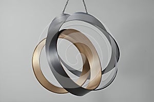 Abstract metallic sculpture on white background for modern design