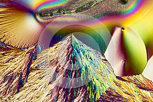 Abstract micrograph of ascorbic acid crystals in brilliant array