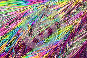 Abstract micrograph of ascorbic acid crystals in brilliant array