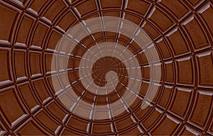 Abstract milk chocolate round spiral made of chocolate bar. Twirl abstract. Chocolate background pattern.Dark chocolate spiral