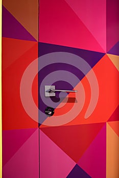 Abstract modern entrance door closeup background. Colorful fashionable textere for design photo