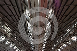 Abstract modern metallic ceiling of an underway of a business