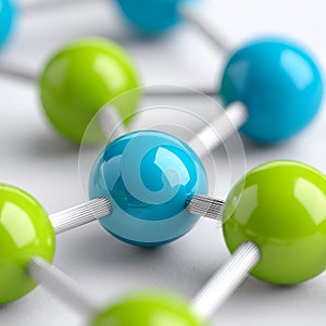 Abstract molecular structure with green and blue spheres.