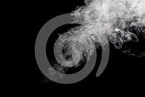 Abstract moving cloud of smoke.White smoke isolated on black background.