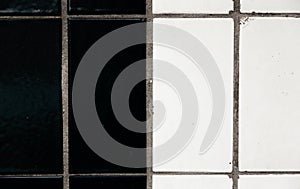 Abstract multi-color black and white background of old cobblestone pavement close-up