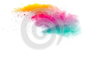 Abstract multi color powder explosion on white background.