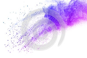 Abstract multi color powder explosion on white background.