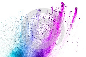 Abstract multi color powder explosion on white background.