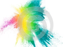 Abstract multi color powder explosion on white background.