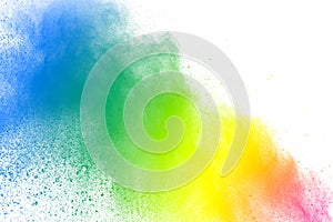 Abstract multi color powder explosion on white background.