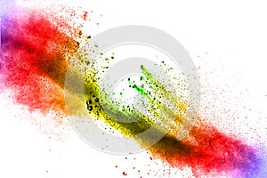 Abstract multi color powder explosion on white background.