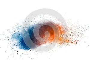 Abstract multi color powder explosion on white background.  Freeze motion of  dust  particles splashing