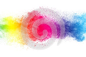 Abstract multi color powder explosion on white background. photo